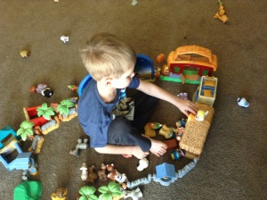 Kona enjoyed playing with the nativity set by himself. 