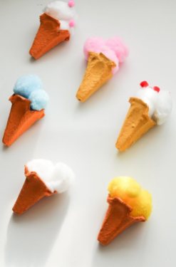 This project from In the Playroom uses egg cartons and cotton balls. http://intheplayroom.co.uk/2015/04/18/egg-carton-ice-cream-cones/